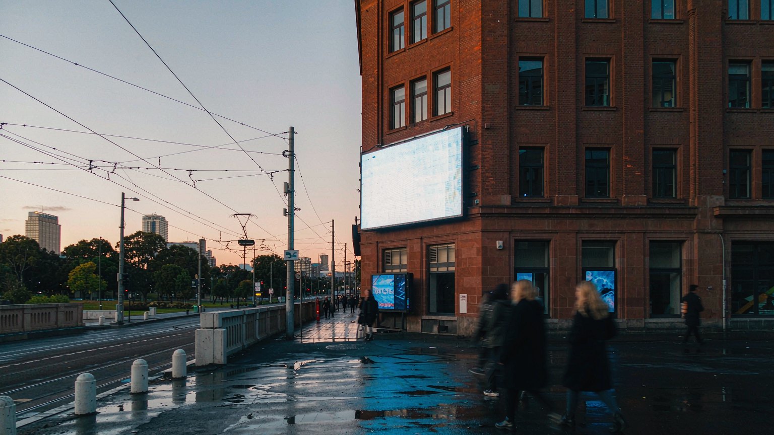 Australian city street with a digital billboard